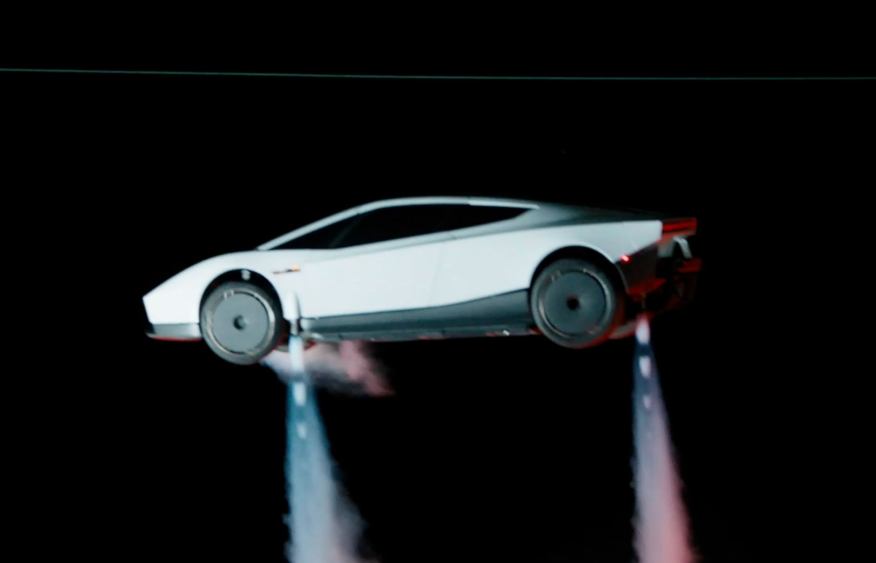 Musk unveils flying Tesla Roadster