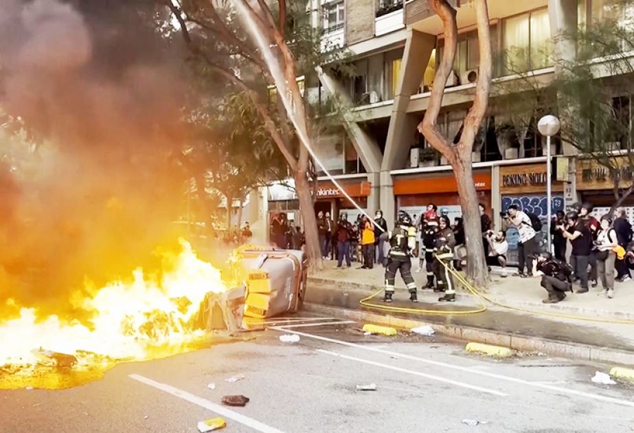 Protests in Barcelona escalate into riots and clashes with police