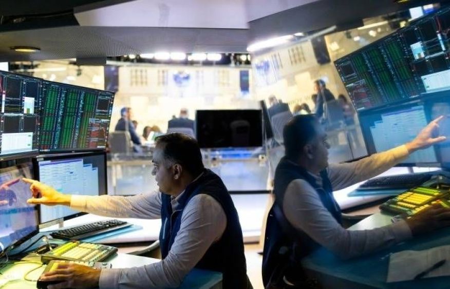 US opens lower as investors assess earnings