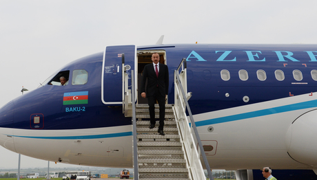 President Aliyev arrives in Great Britain