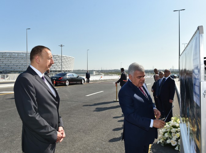 President Aliyev opens road, transport infrastructures in Baku
