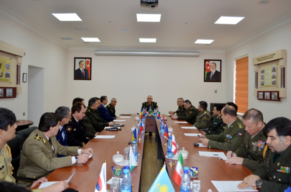 Foreign military attaches visit International Military Cooperation Department