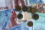 Int'l group disburses first loan in Azeri currency