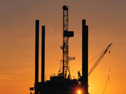 IEA revises up global oil demand forecasts