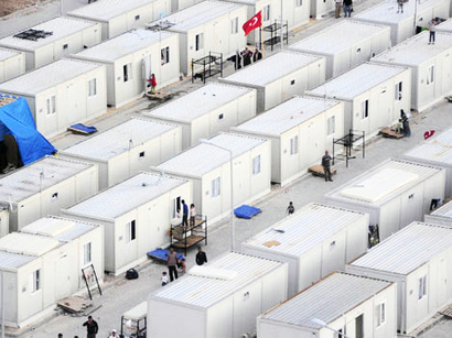 Building of large container town for Syrian refugees in Turkey to be completed in May