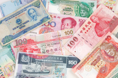 Asian currencies set for weekly gain on oil rally, China easing