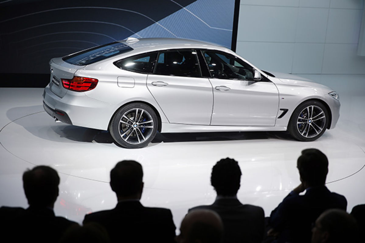 BMW to pay $820 million to support China car dealers, group says