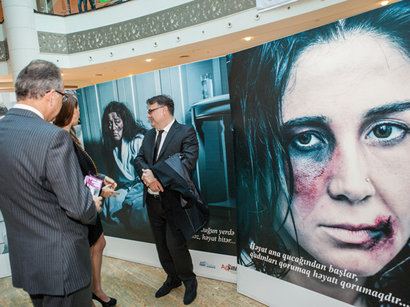 Photo exhibition marks International Day for the Elimination of Violence Against Women