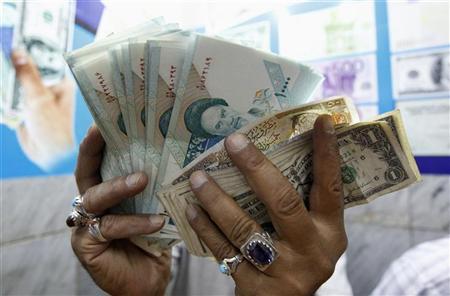 Iran plans to phase out dollar, euro in int'l transactions