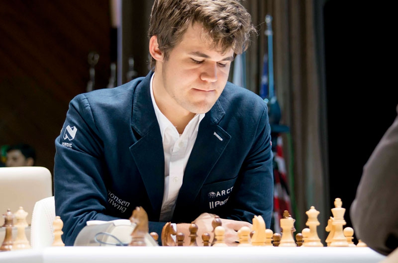 Magnus still on top, Caruana saves sixth Shamkir Chess' round