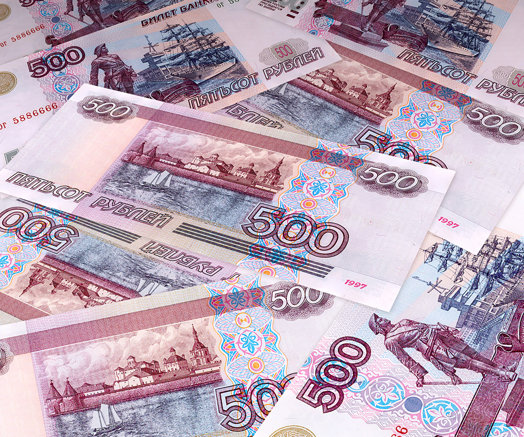 Ruble extends drop as bank of Russia raises band most since 2012