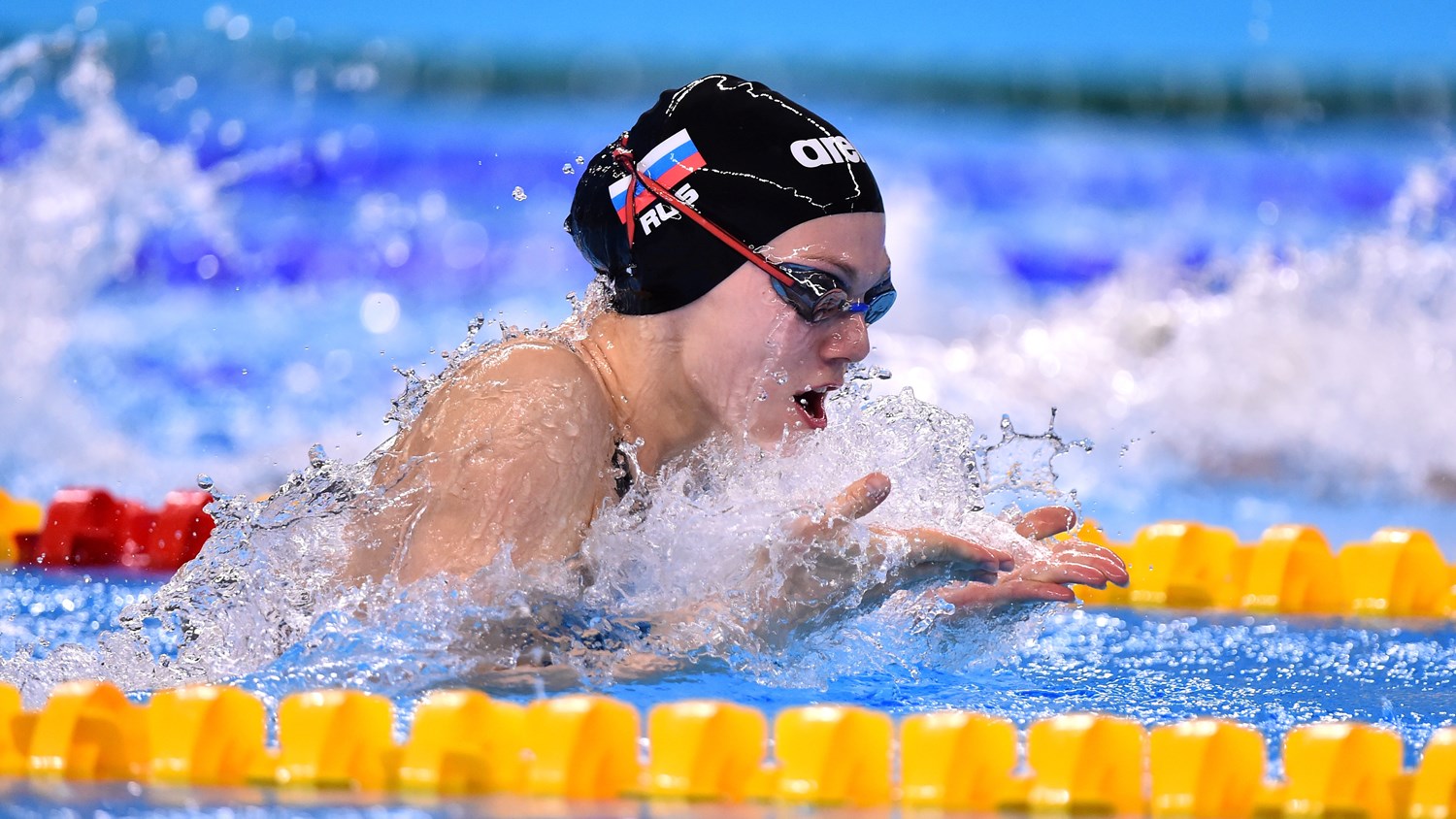 Russians flex their muscles as Swimming starts