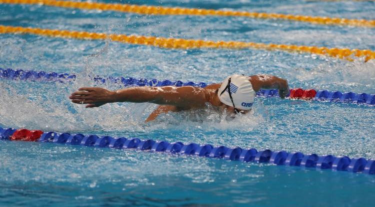 Record-breaking Astashkina wins triple gold in pool